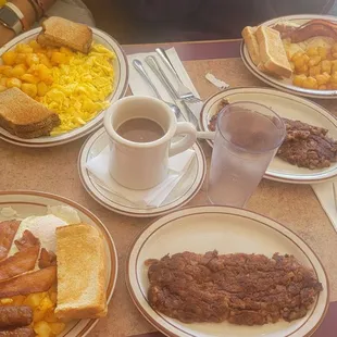 a table full of breakfast foods