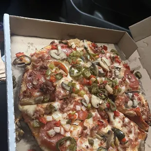 Supreme, minus sausage add  bacon. As you can see I took a little snip off a little guy over there. Amazing as always...