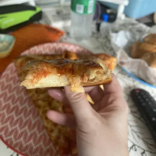 Here you can see the pizza after a bite. Yummy!