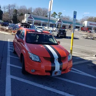 Illegally parking in a handicapped ramp spot