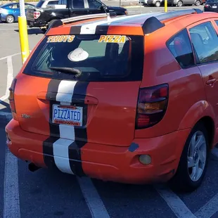 Teddy illegally parking in a handicapped ramp spot