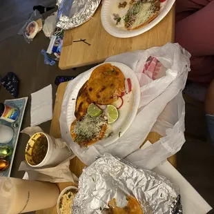 Bit into my cold taco, plate has &quot;tostada&quot; , quesadilla and mulita, second plate two tacos  and consomé, no chips or salsa in sight