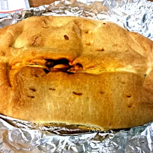 The dry pastry shell of the pepperoni pasty was expertly balanced by the bland marinara sauce.