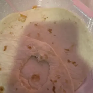 Looks to be a bitten tortilla
