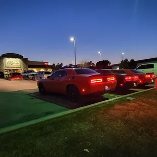 two cars parked in a parking lot