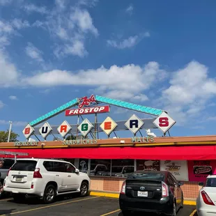 cars parked in front of the store