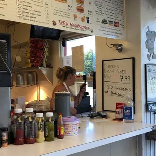 a woman behind the counter
