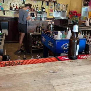 a man standing at the bar