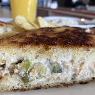 Tuna melt with chopped jalapeños on Italian toast
