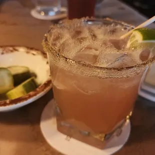 Huckleberry margarita and house pickles