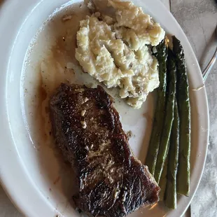 A very overcooked New York Strip