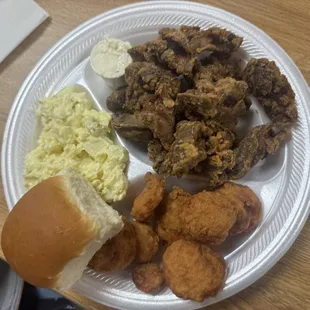 Chicken, livers, potato salad, and squash