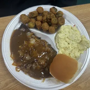 Country fried steak, potato salad, and fried okra