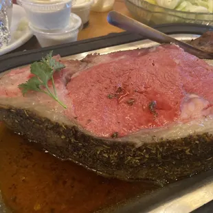 Rare 16oz Prime Rib ($28.95 Fri/Sat/Sun special) two select sides. Was fantastic!