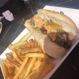 Cheesesteak, barley any meat for 15.99 is the only problem, other than that it&apos;s not bad..