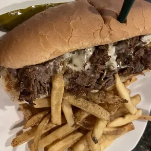 a beef sandwich and fries