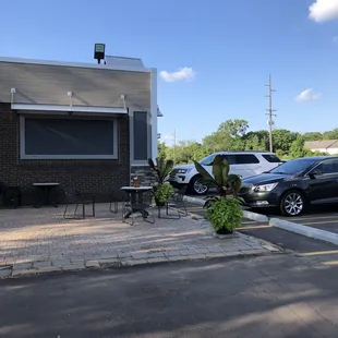 parking lot with tables and chairs
