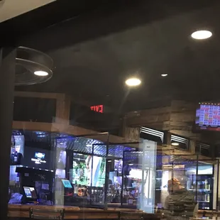Partitions between each bar spot and all throughout the restaurant.