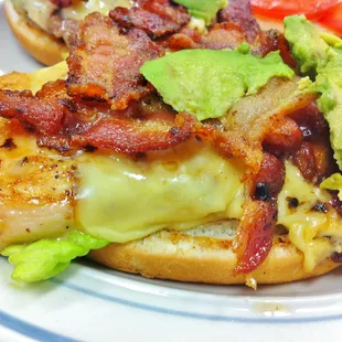 Grilled Chicken Sandwich comes with fresh slices of avocado, crispy strips of bacon and so much more.