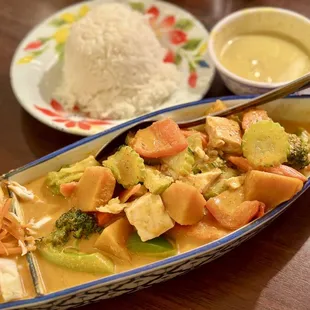a plate of rice and vegetables