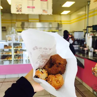 Blueberry donut and two donut holes