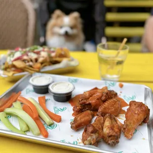 Buffalo Wings // 2 Stars (7 pc-$14) + Ground Beef Nachos // 3 Stars (Small-$18)