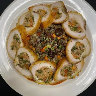 Mediterranean Stuffed Chicken served with a wild rice pilaf