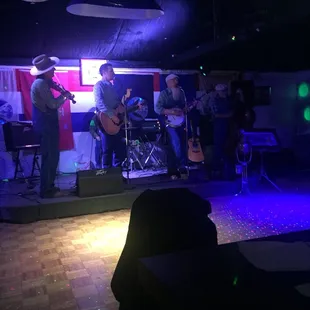 a band performing on stage