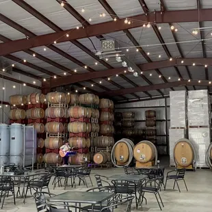 a wine cellar with tables and chairs