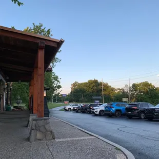 a row of parked cars in a parking lot