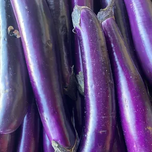 a pile of purple eggplant