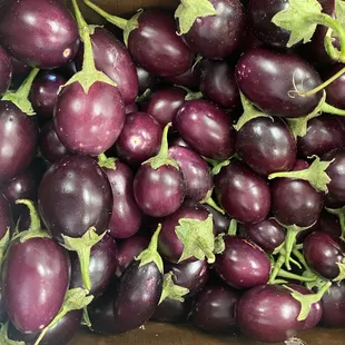 a pile of fresh eggplant