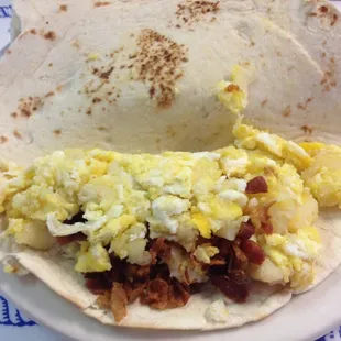 Generous potato, bacon, and egg taco