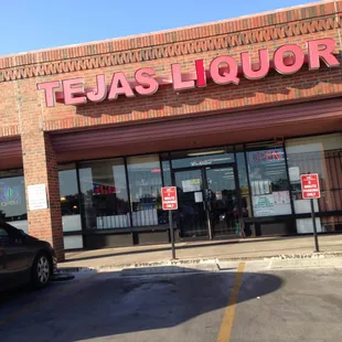 a car parked in front of the store