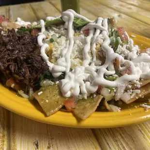 Green chilaquiles with everything and then some!! Added barbacoa bc it&apos;s my fave!