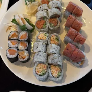 Man on Fire Roll, spicy tuna roll, spicy crab roll and smoked salmon roll.
