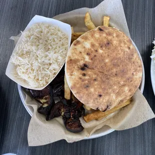Rice, amazing eggplant, fries, and their delicious pita