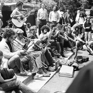 Trombone, clarinet, guitar on Sproul Plaza.  I took all of these photographs in the years 1969-1971.  ---Tom Brody