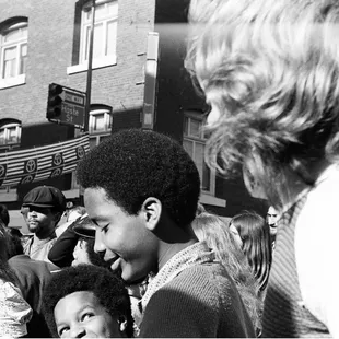 Happy gathering on Telegraph Ave. You can see sign reading HASTE ST. - - -Tom Brody