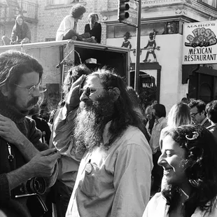 Another happy gathering on Telegraph Ave.  See, MARIO'S LA FIESTA Mexican Restaurant.  Next to that is Garden Spot. ---Tom Brody