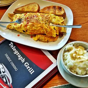 Famous Beast Omelette n Grits five Egg all the Meats