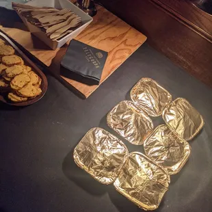 a plate of cookies and a tray of crackers