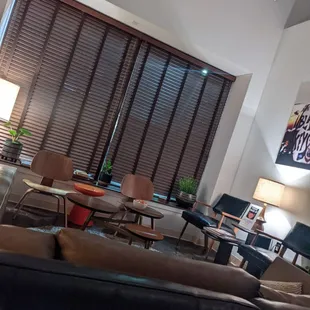 a living room with leather furniture