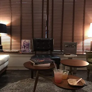 a living room with two chairs and a coffee table