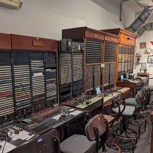 Very old phone operator switchboards