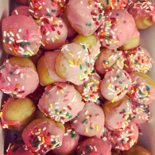 Strawberry dipping donuts.