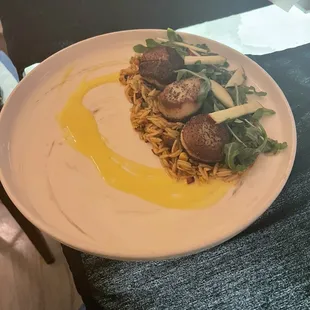 Scallops with risotto, arugula salad and citrus sauce, so good