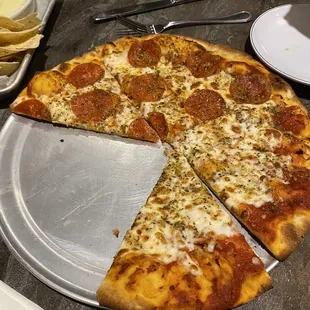 Pizza half pepperoni half cheese