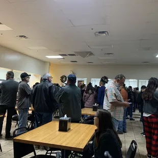12/21/23 in line for tamales 0600.