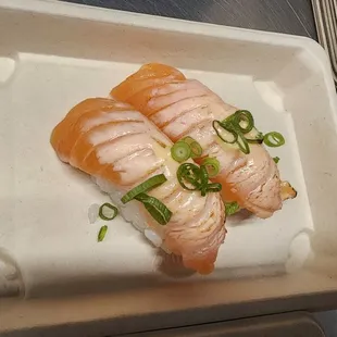 Sear salmon nigiri